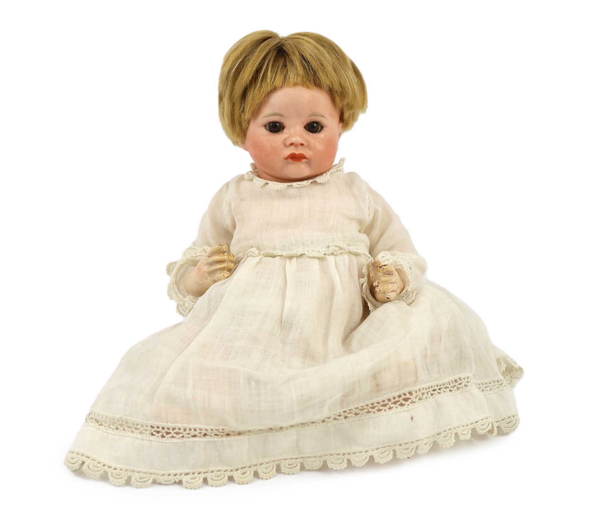 An SFBJ bisque character doll, French, circa 1925, 9in.